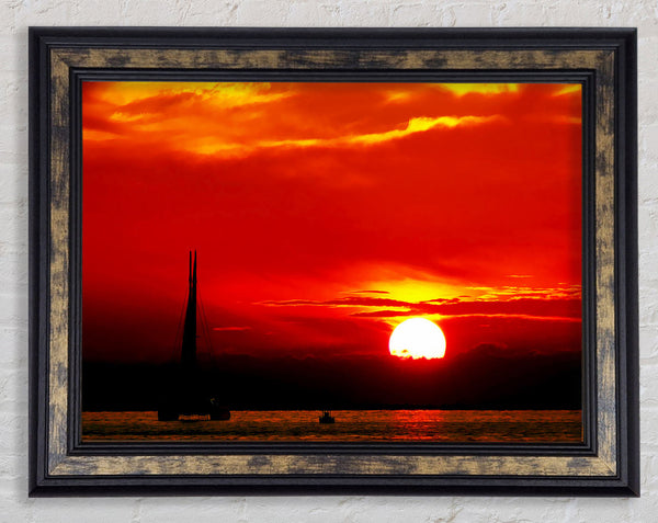 Sailing Into The Red Sunset Framed Print