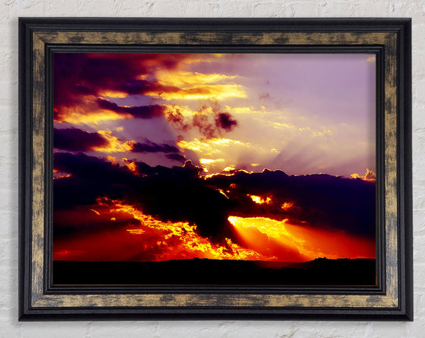 Red Sunrays Through The Clouds Framed Print