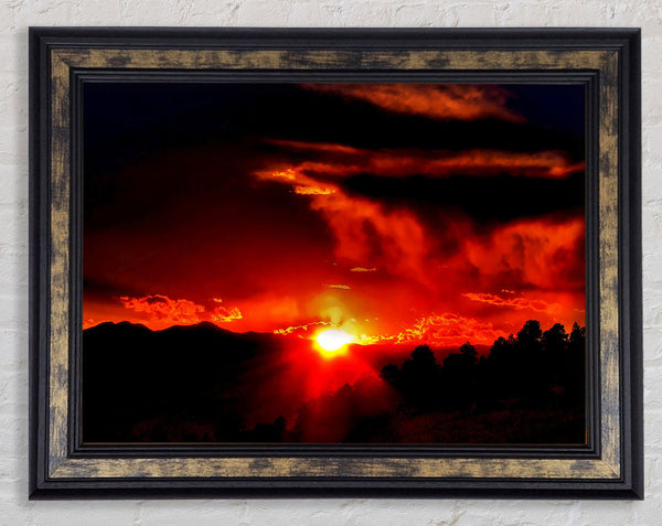 Vibrant Red Sun Clouds Framed Print