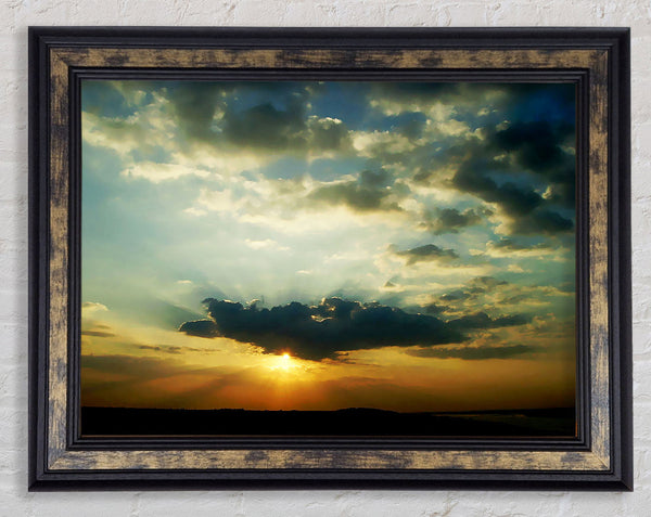 Sun Blaze Skies Framed Print
