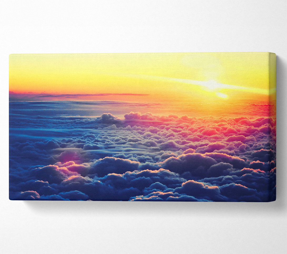  A Canvas Print of Sunrise Above The Clouds Canvas Print