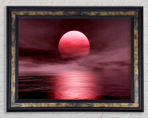 The Huge Red Sun Over The Grey Ocean Framed Print