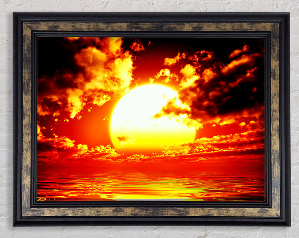 The Huge Sun Over The Ocean Framed Print