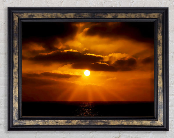 Golden Sun Rays Through The Clouds Framed Print