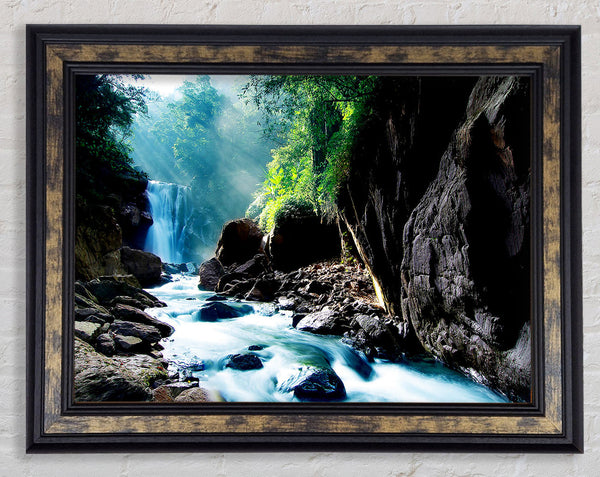 Sunbeams Over The Mountain Waterfall Framed Print