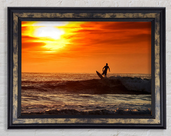 Sunset Surfing Framed Print
