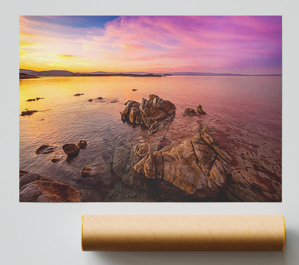 Pink Skies Over The Ocean Rocks Poster