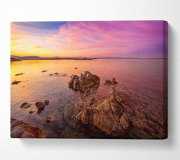  A Canvas Print of Pink Skies Over The Ocean Rocks Canvas Print