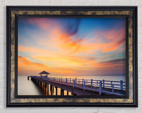 Golden Pier At Dusk Framed Print