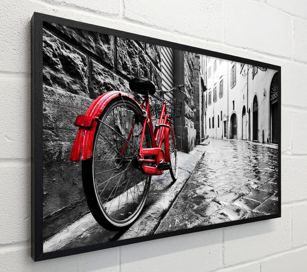 Red Bicycle In The Cobbled Streets