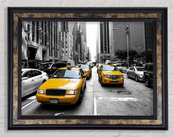 Yellow Cabs On The Inner City Steets Framed Print