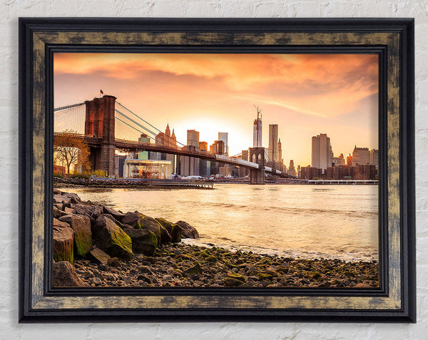 As The Sun Comes Up Over The Brooklyn Bridge Framed Print