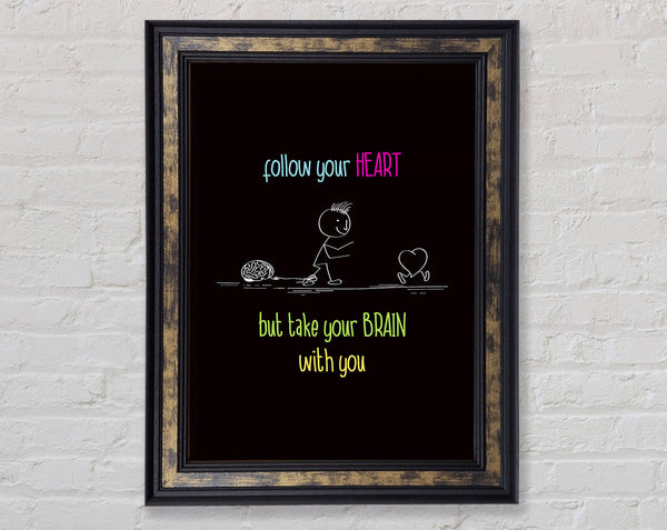 Follow Your Heart But Take Your Brain Framed Print