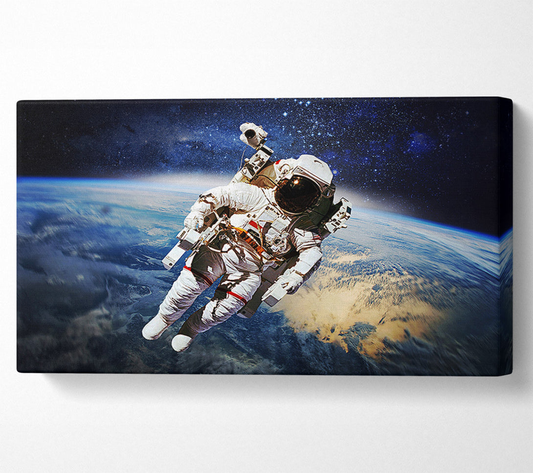  A Canvas Print of Astronaut Above The Earth Canvas Wall Art