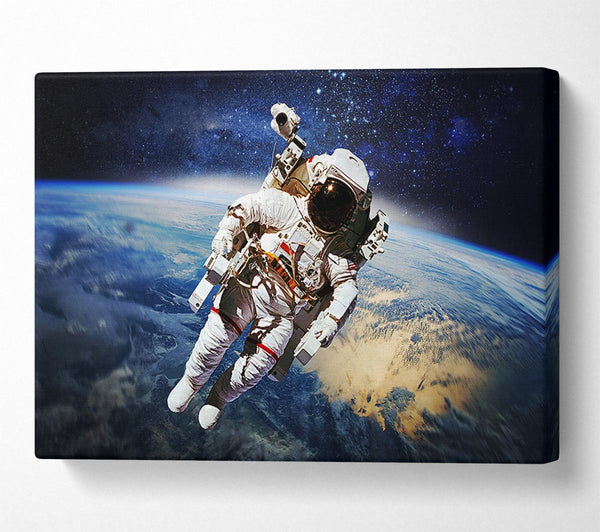  A Canvas Print of Astronaut Above The Earth Canvas Wall Art