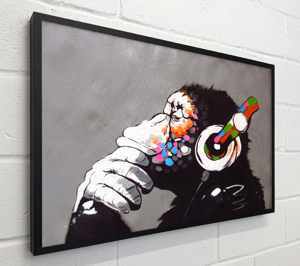 Banksy Chimp Headphones Thinking