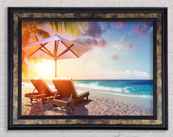 Sun chairs by the sea Framed Print