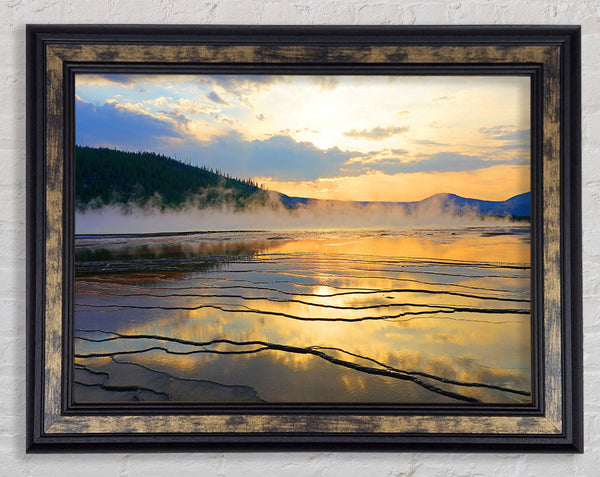 Frozen lake sunset Framed Print