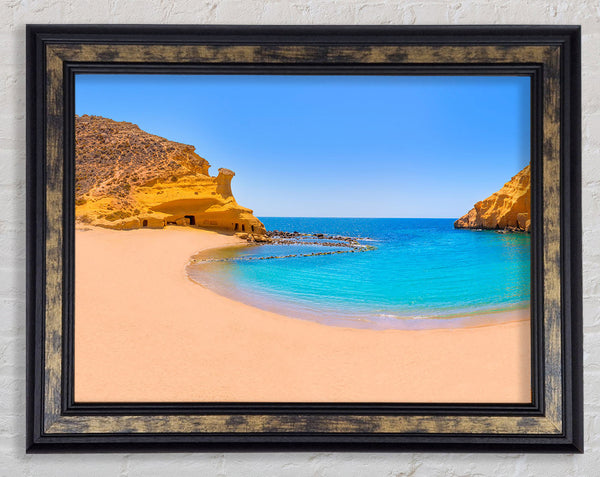 Beach cove blue seas Framed Print