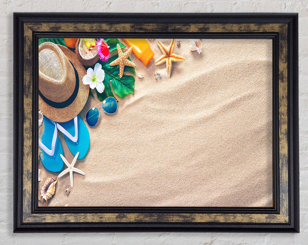 Sunglasses and hat on the beach Framed Print