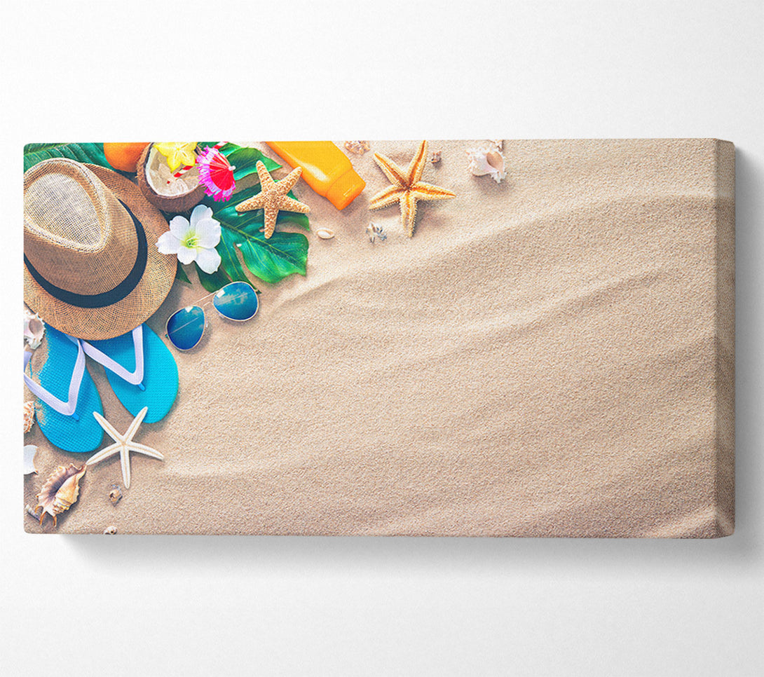  A Canvas Print of Sunglasses and hat on the beach Canvas Wall Art