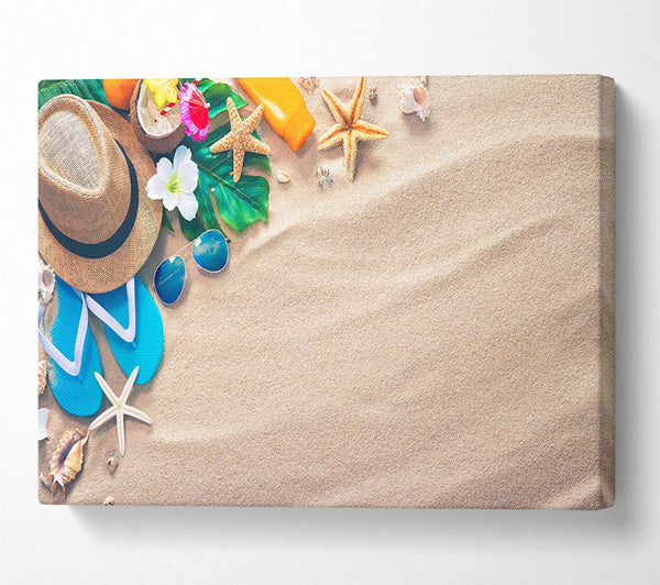 A Canvas Print of Sunglasses and hat on the beach Canvas Wall Art