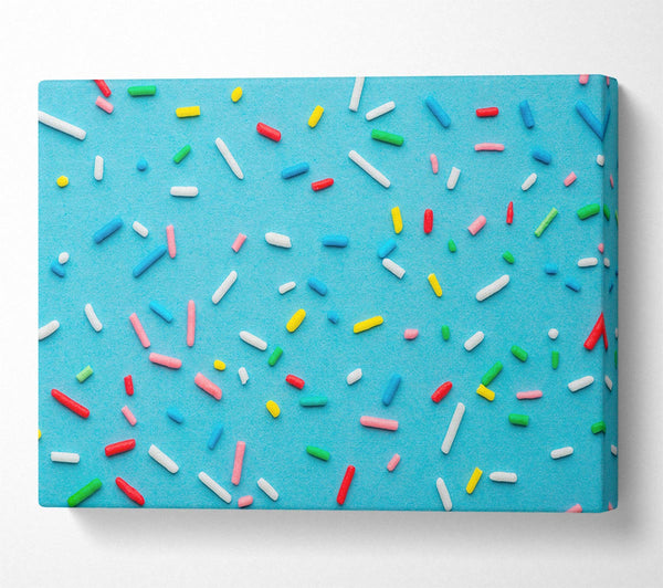 Hundreds and thousands on blue Canvas Wall Art