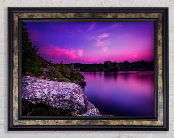 purple and blue lake off the cliffs Framed Print