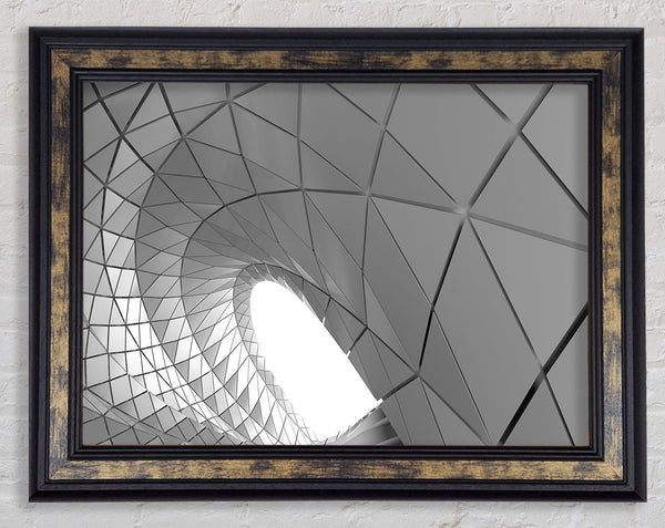 Swirl of geometric shapes on building Framed Print