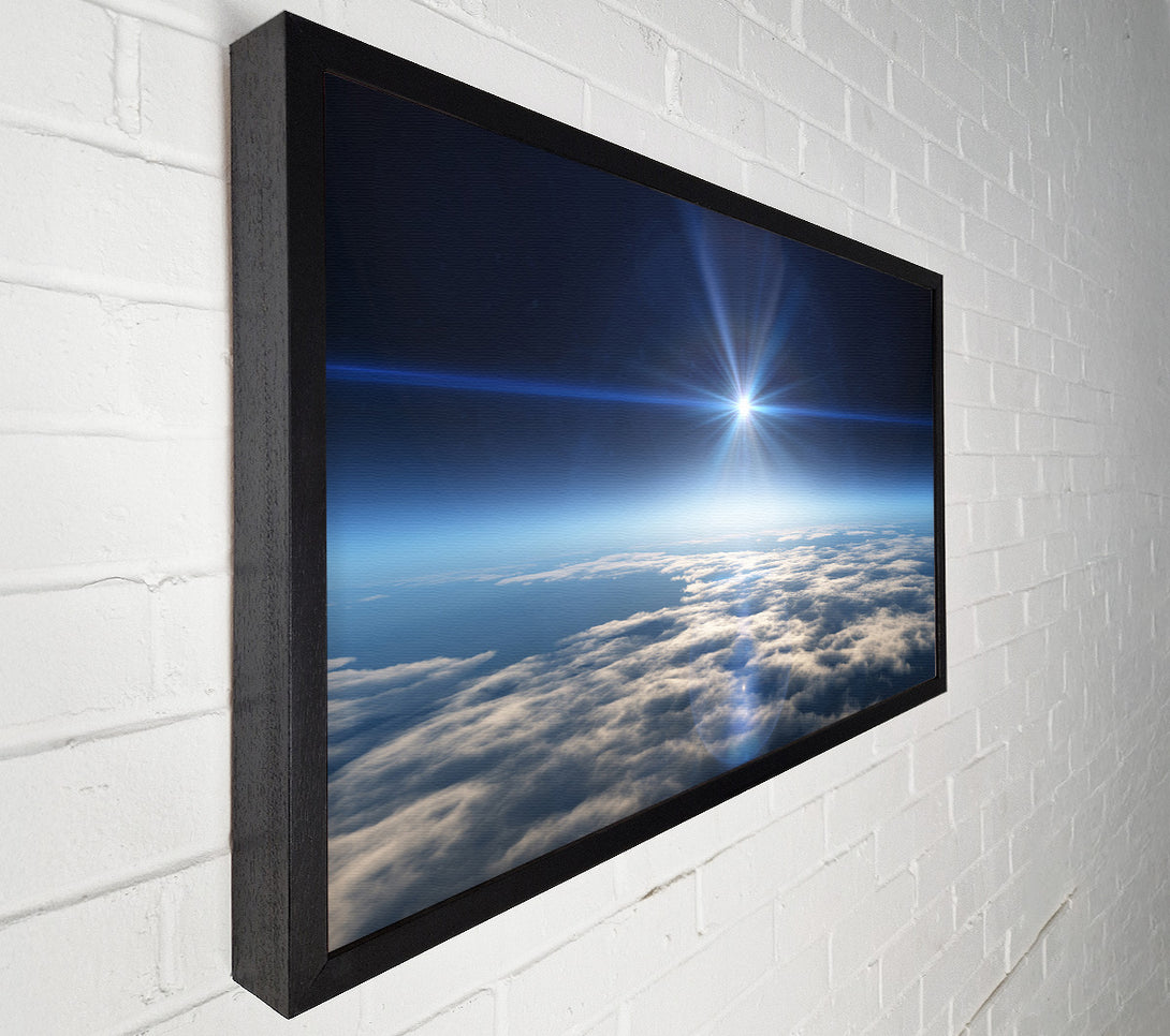  A Canvas Print of The sun above the clouds and atmostphere Canvas Print
