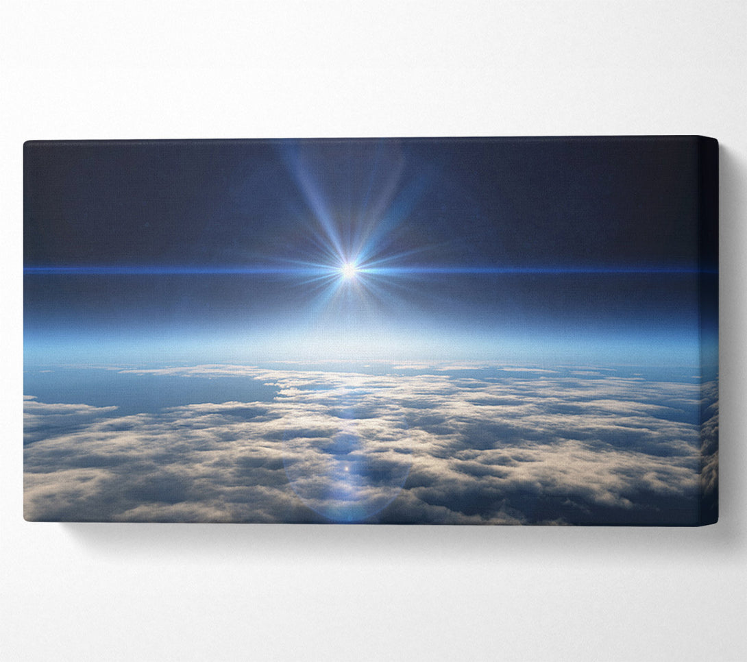  A Canvas Print of The sun above the clouds and atmostphere Canvas Print