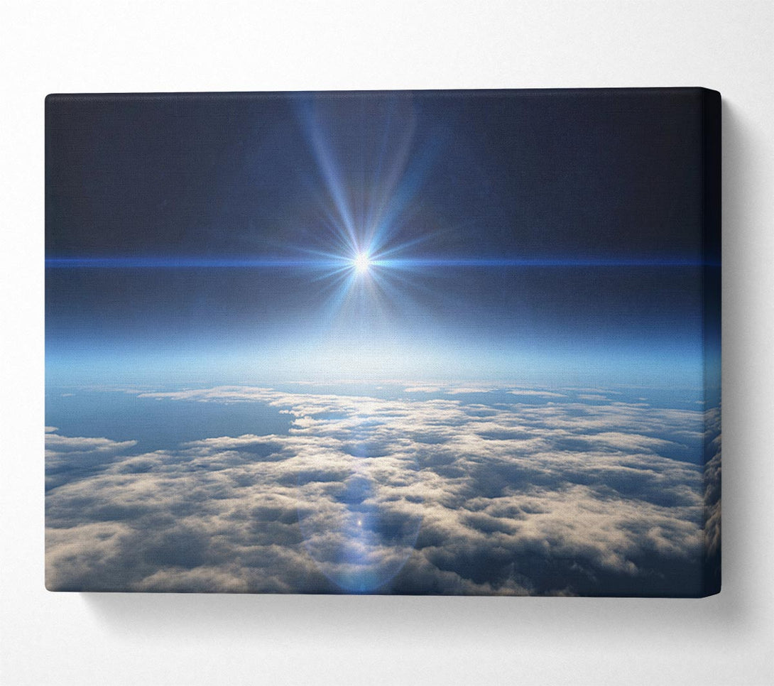  A Canvas Print of The sun above the clouds and atmostphere Canvas Print