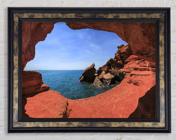 Sea from the view of a cave Framed Print