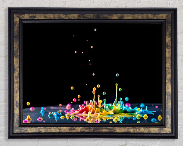 Colour splashes on a surface Framed Print