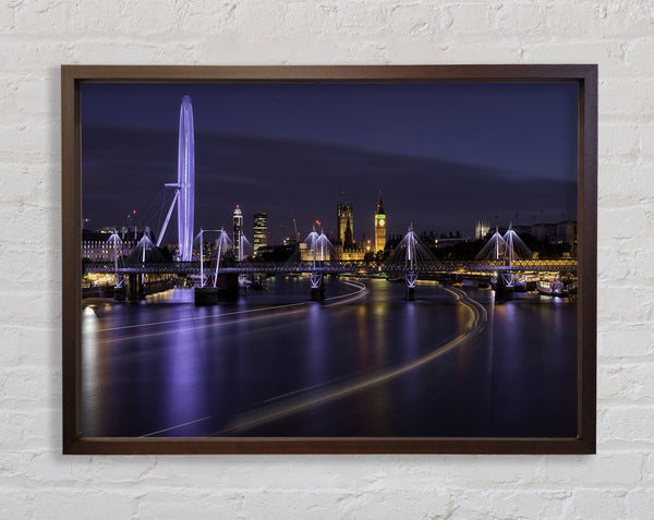 London at night light trails Framed Print