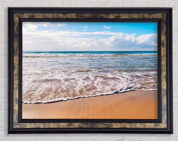 Beautiful sandy day at the beach Framed Print