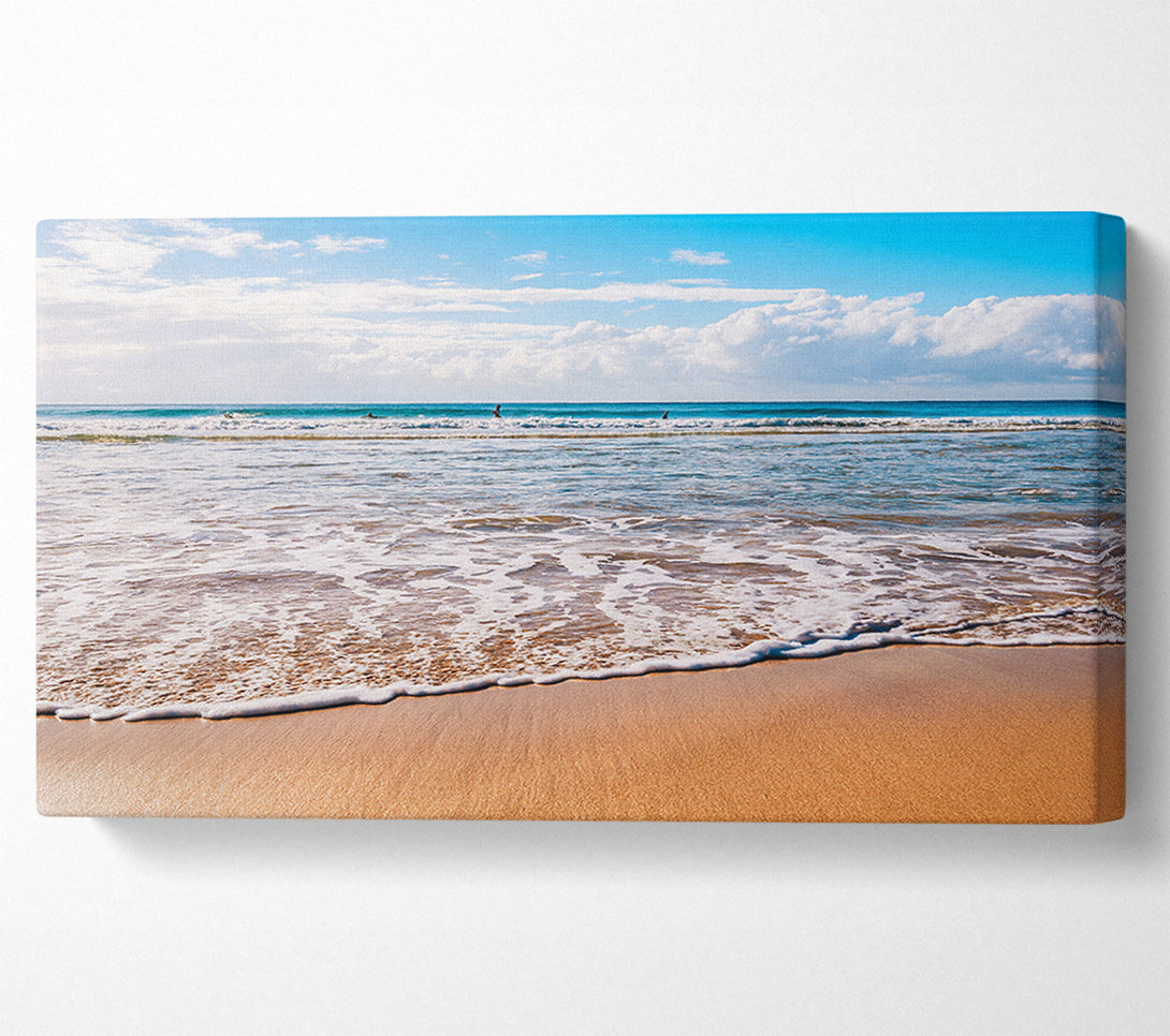  A Canvas Print of Beautiful sandy day at the beach Canvas Print
