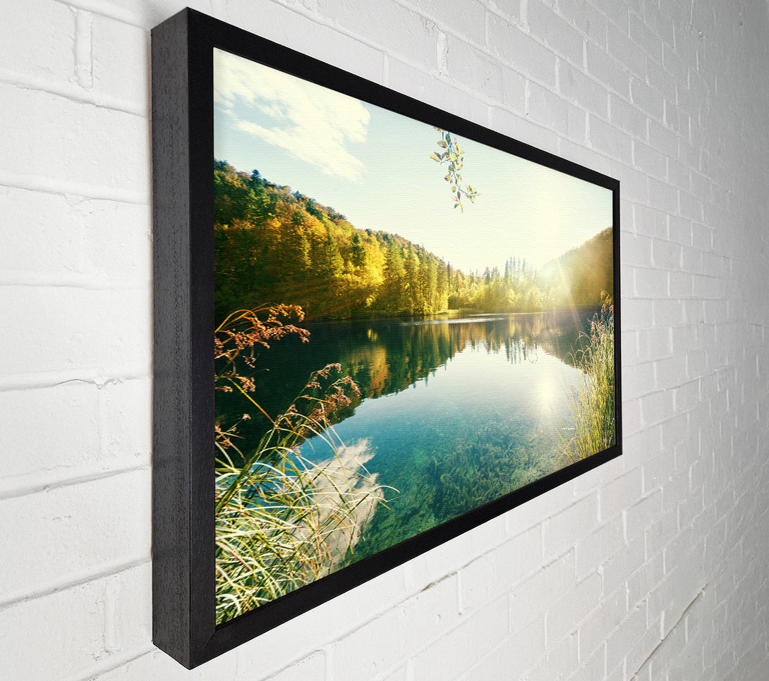  A Canvas Print of Sun shining on the calm river Canvas Print