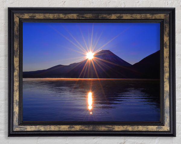 Sunset over the mountain dusk Framed Print