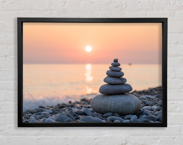 Zen-Steine ​​bei Sonnenuntergang am Strand