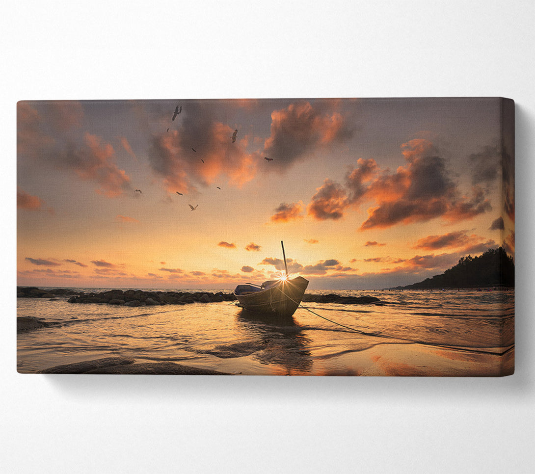  A Canvas Print of Sunset finishing boat on the beach Canvas Wall Art