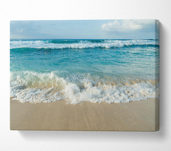  A Canvas Print of Crashing waves on the sandy beach Canvas Art