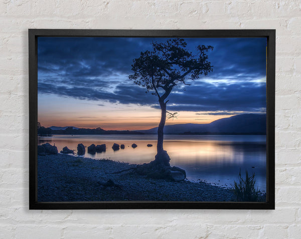 Night time blues by the river Framed Print