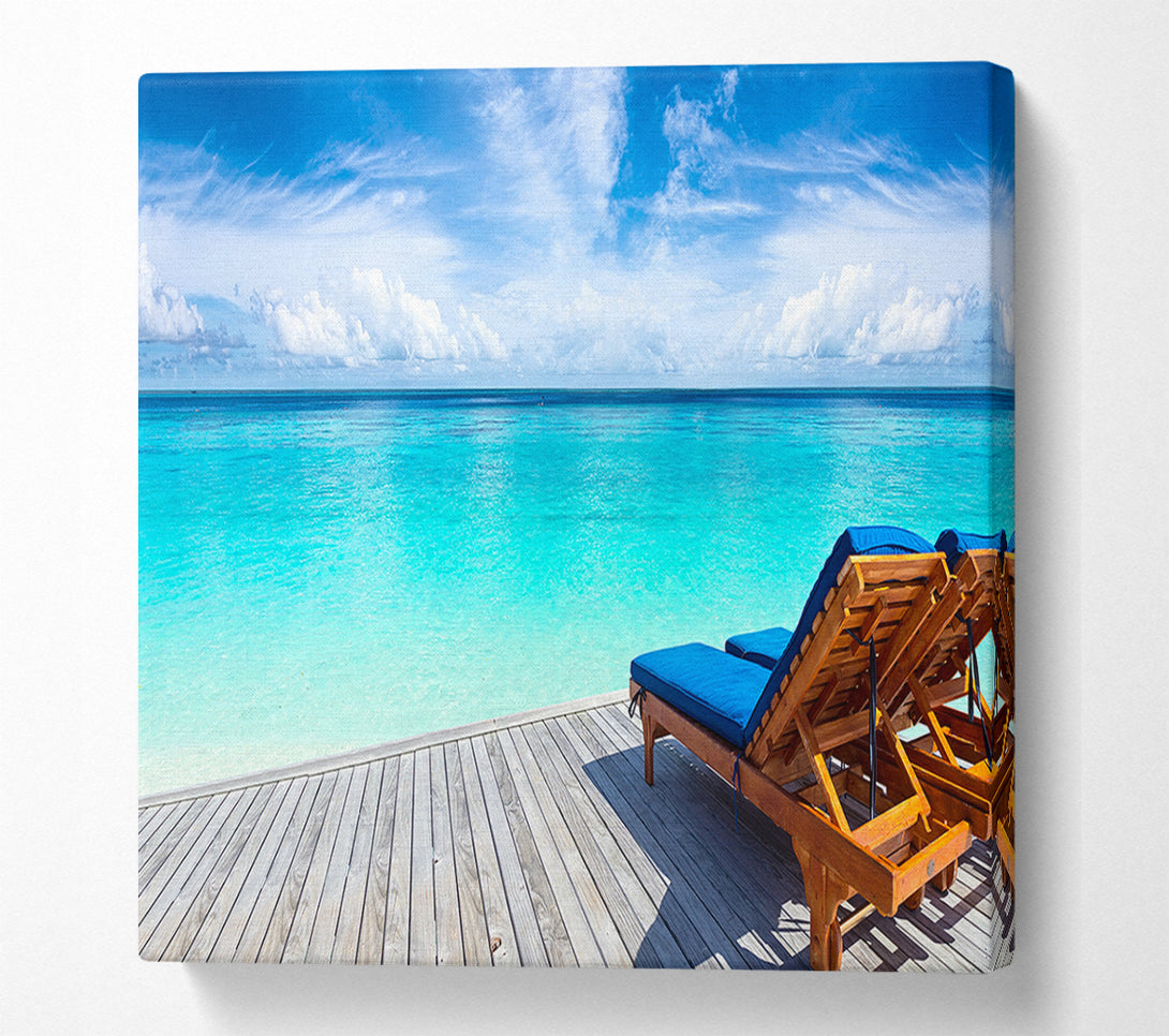  A Canvas Print of sunchairs on decking on the beach Canvas Wall Art