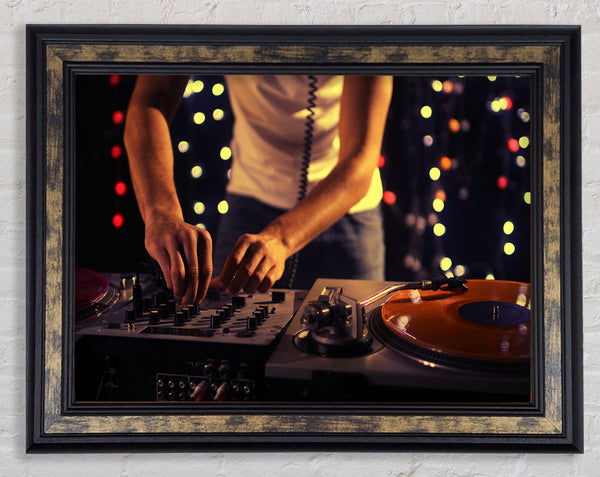 Mixing on the DJ desk Framed Print