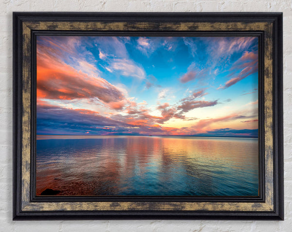 Stunning skies above the sea Framed Print