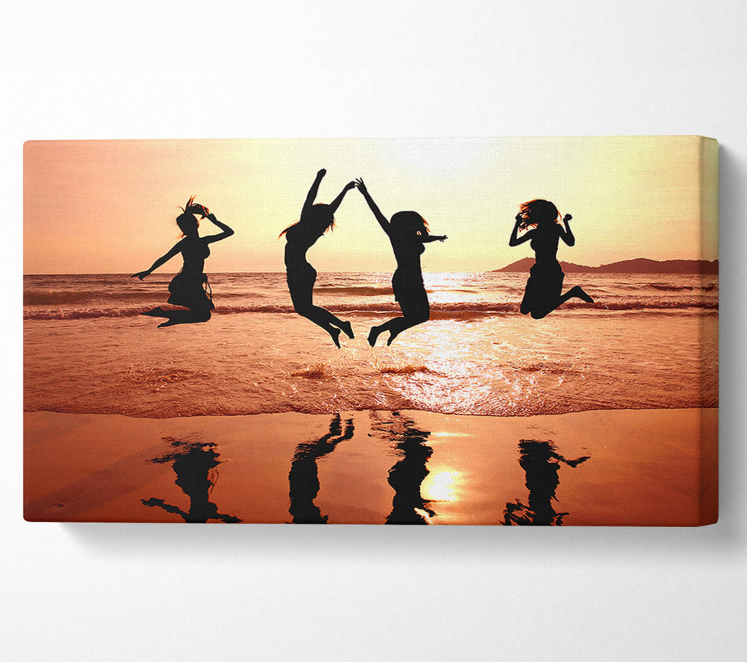  A Canvas Print of People jumping on the beach Canvas Print