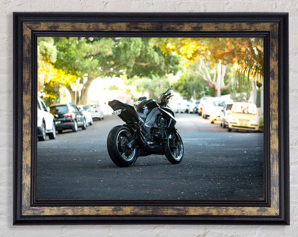 Motorbike on the street Framed Print