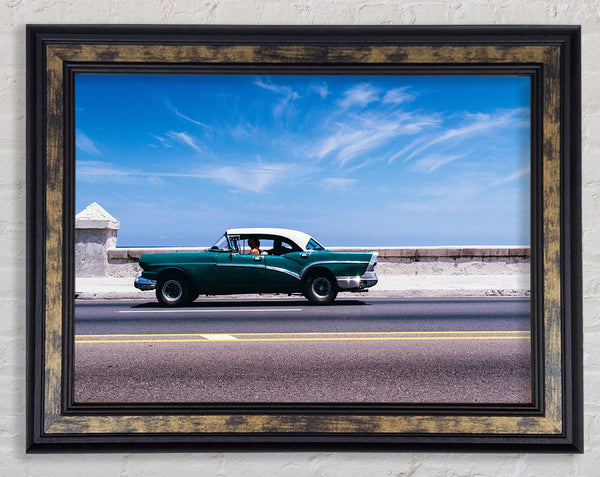Classic car down the highway Framed Print