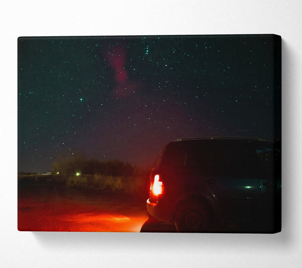  A Canvas Print of Red Taillights Under Stars Canvas Print